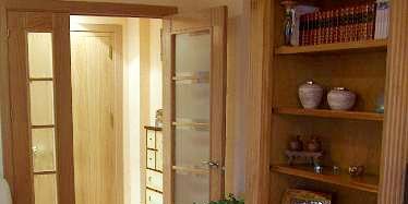 Wood, Floor, Hardwood, Flooring, Room, Wood stain, Interior design, Shelf, Door, Fixture, 