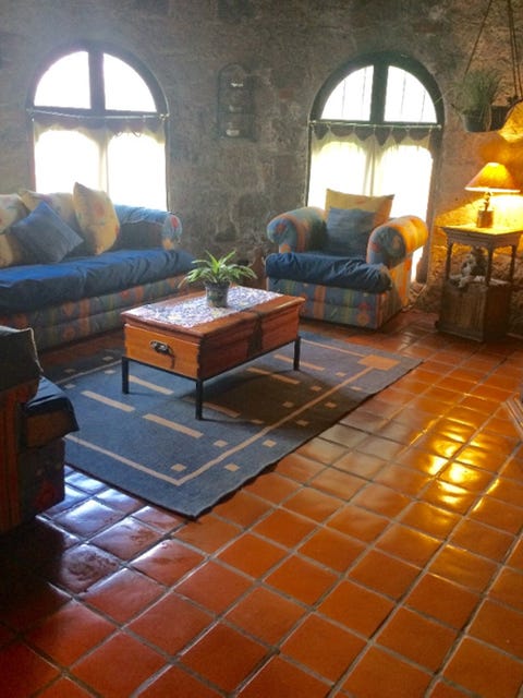 Lighting, Room, Interior design, Wood, Floor, Flooring, Couch, Furniture, Table, Wall, 