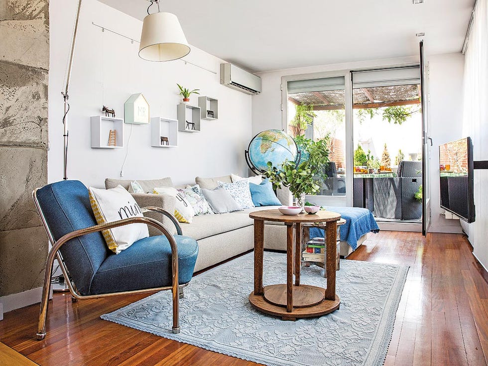 Living room, Room, Furniture, Blue, Interior design, Property, Building, House, Home, Table, 