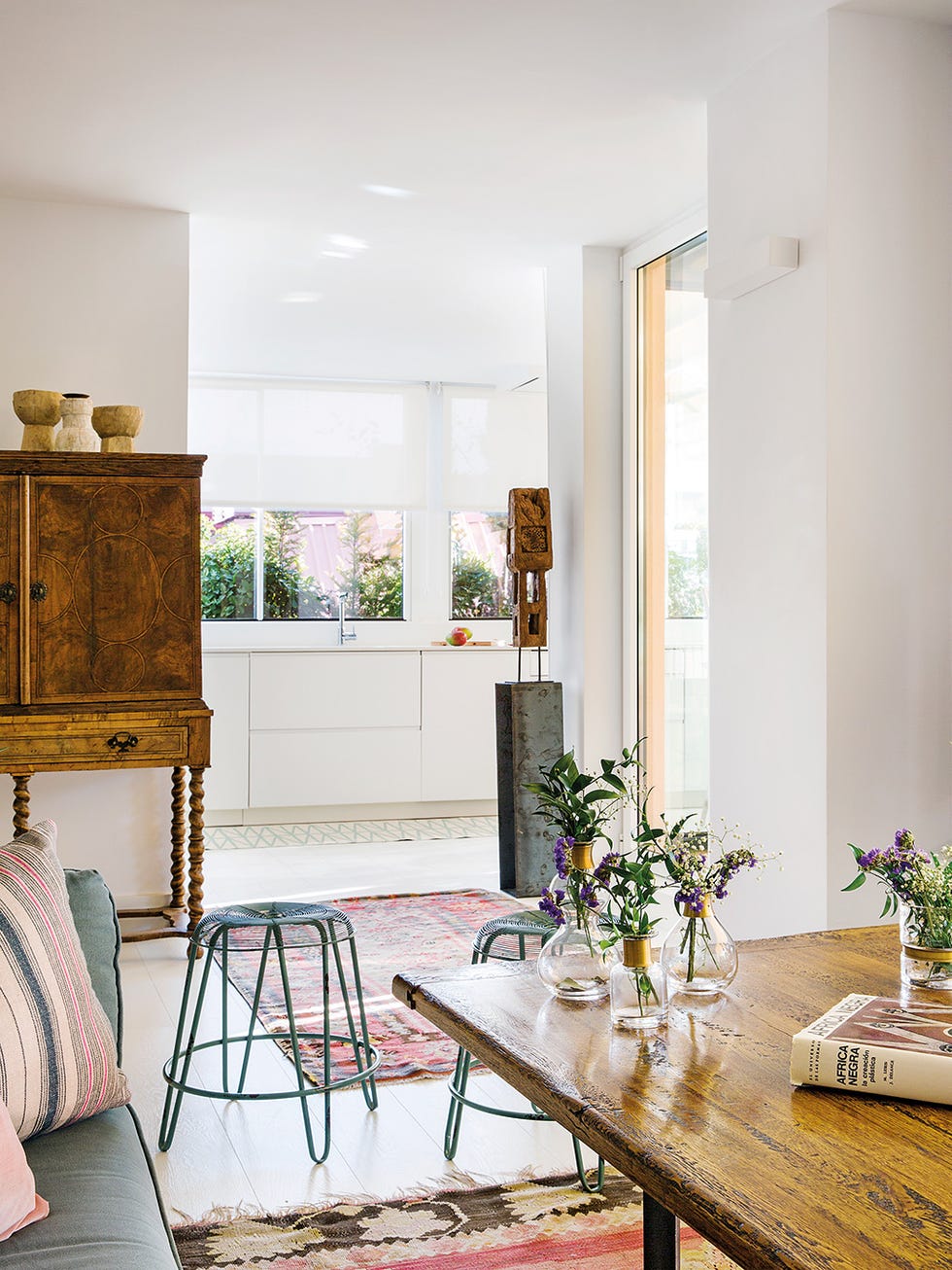 Un ático reformado con terrazas: comedor y cocina