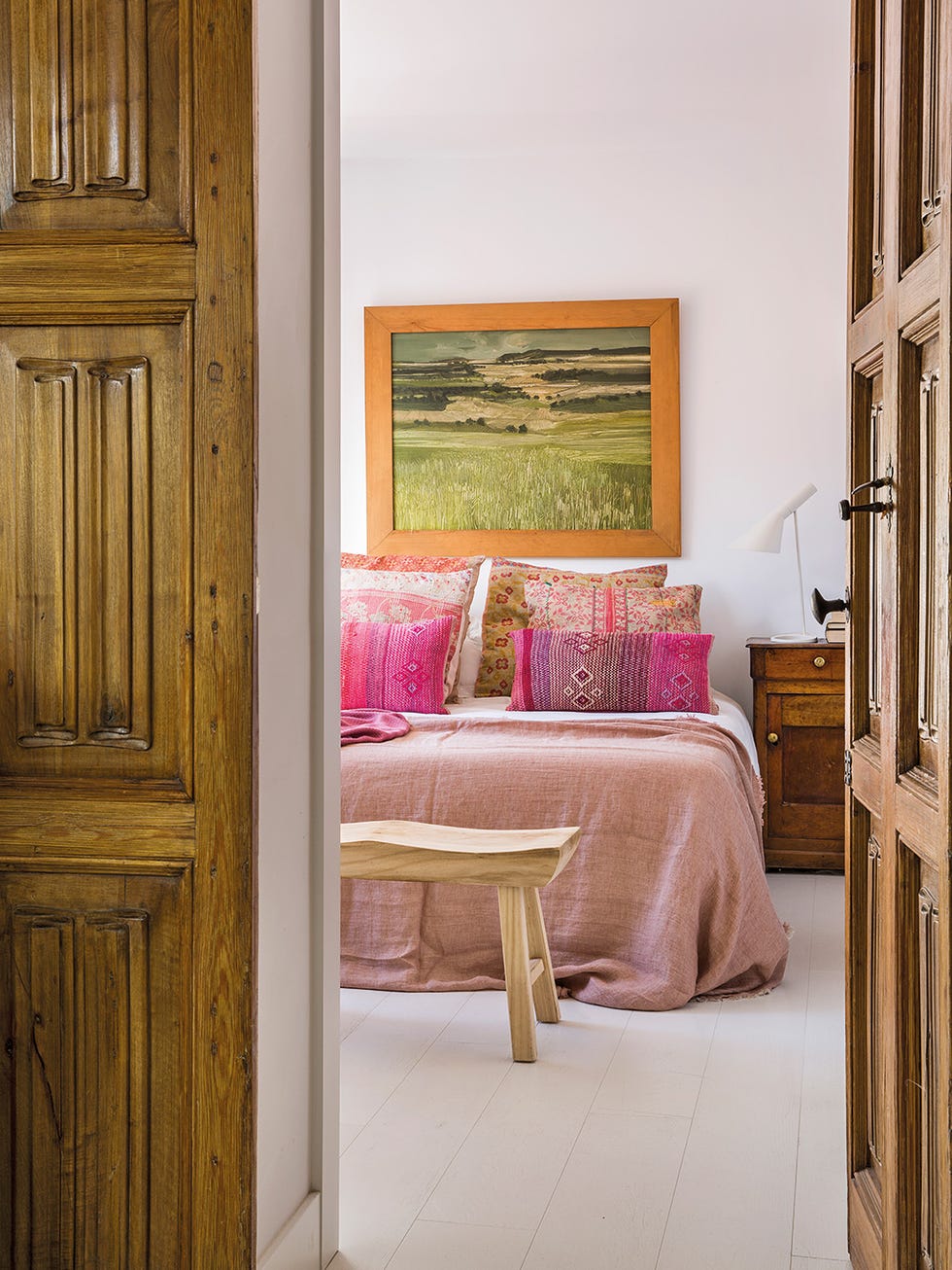 Un ático reformado con terrazas: dormitorio