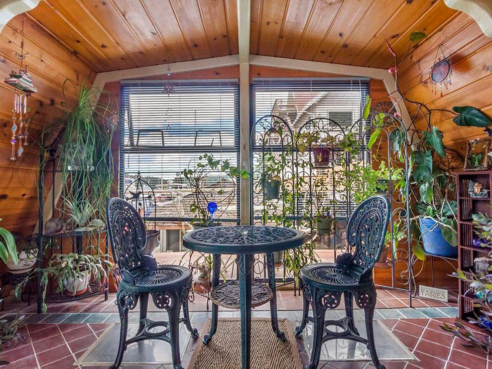 Interior design, Furniture, Table, Ceiling, Beam, Chair, Houseplant, Flowerpot, Shelf, Outdoor table, 