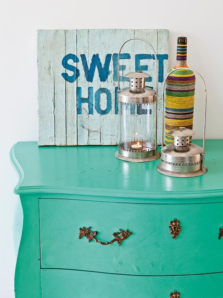 Green, Liqueur, Turquoise, Drink, Distilled beverage, Shelf, Table, Bottle, Furniture, Vodka, 