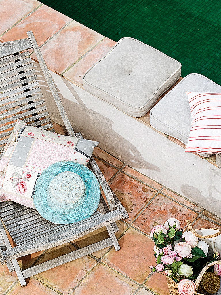 Teal, Peach, Outdoor furniture, Design, Household supply, Circle, Home accessories, Paper, Paper product, Artificial flower, 