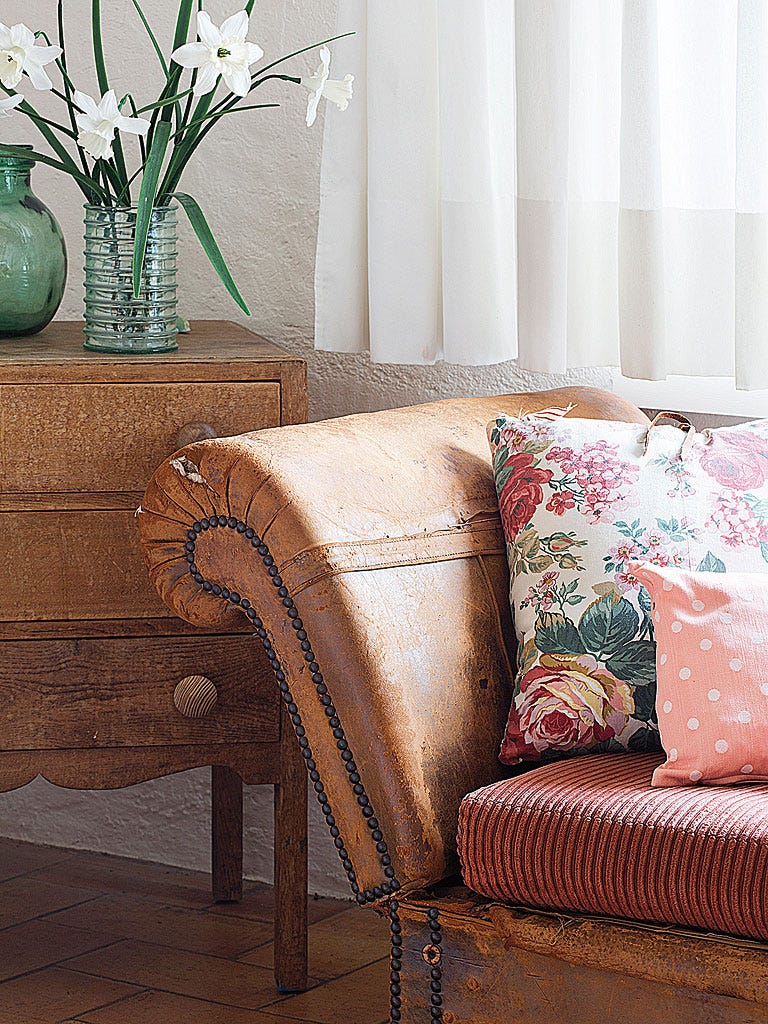 Furniture, Room, Interior design, Pink, Floor, Living room, Cushion, Chair, Brown, Curtain, 