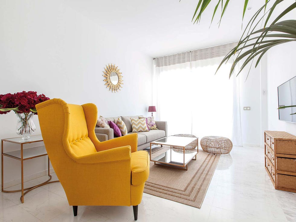 Furniture, Living room, Room, Yellow, Interior design, Property, Chair, Orange, Floor, Table, 