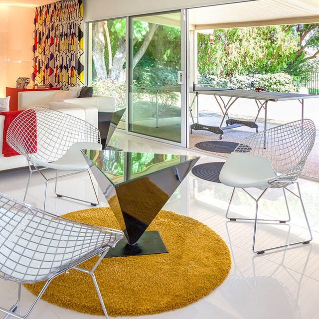 Furniture, Interior design, Floor, Flooring, Chair, Outdoor table, Light fixture, Shade, Outdoor furniture, Design, 