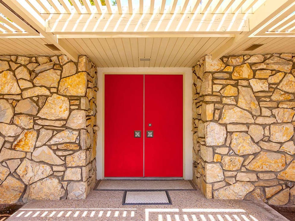 Yellow, Property, Door, Wall, Floor, Real estate, Ceiling, Home door, Fixture, Stone wall, 