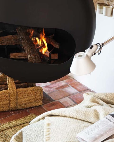 Flame, Fire, Heat, Gas, Beige, Home accessories, Hearth, Fireplace, Linens, Building material, 