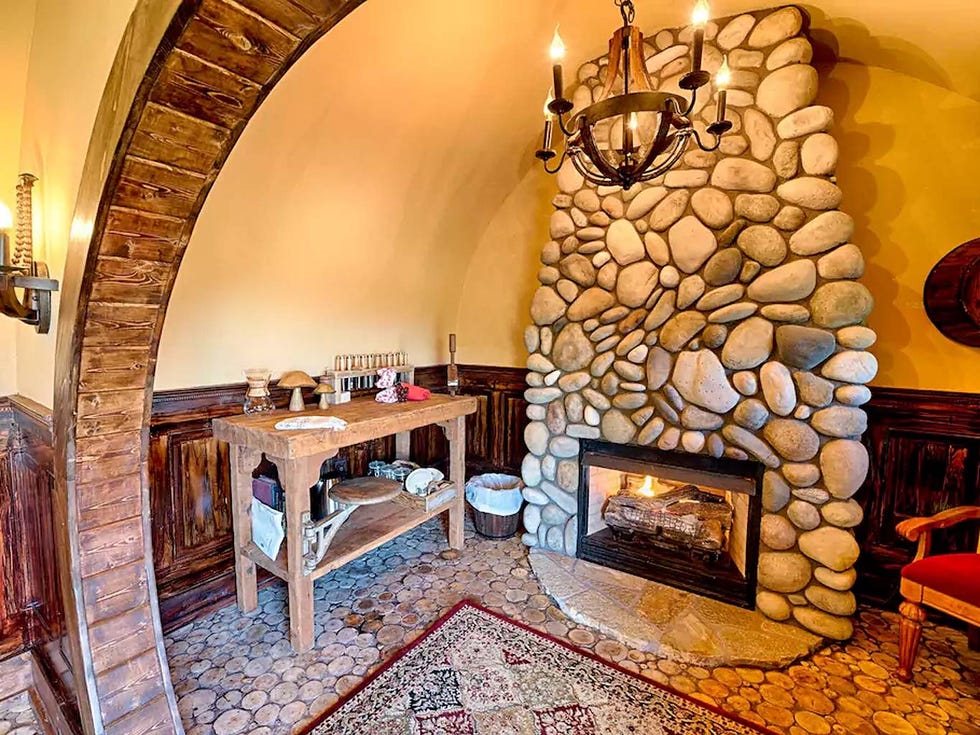 Room, Interior design, Property, Floor, Wall, Hearth, Table, Interior design, Light fixture, Gas, 