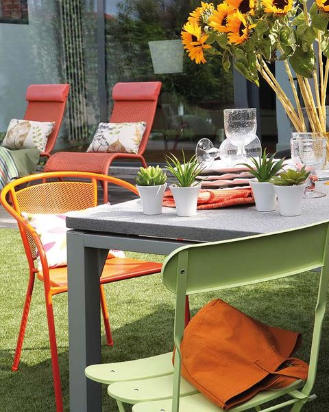 Furniture, Table, Chair, Outdoor furniture, Orange, Petal, Outdoor table, Centrepiece, Flowerpot, Cut flowers, 