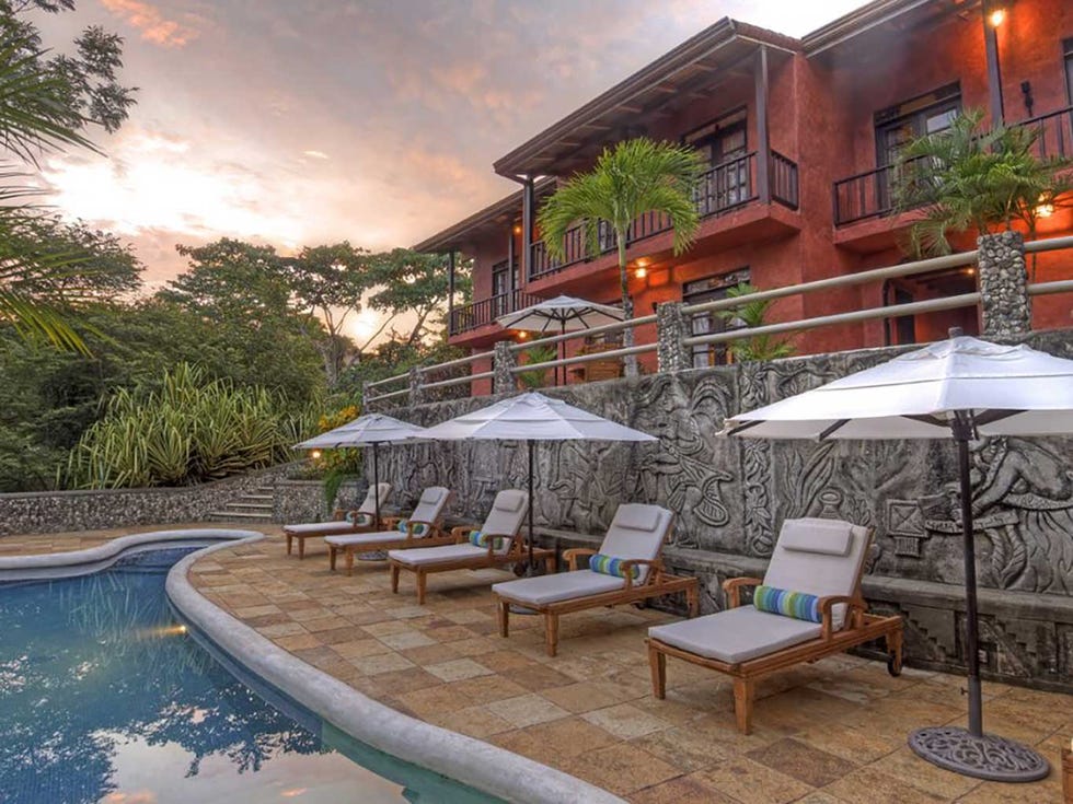 Property, Swimming pool, Building, Resort, Real estate, Patio, Home, House, Backyard, Architecture, 