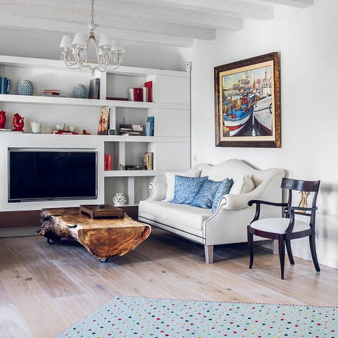 Living room, Furniture, Room, Interior design, Floor, Shelf, Property, Table, Wall, Wood flooring, 