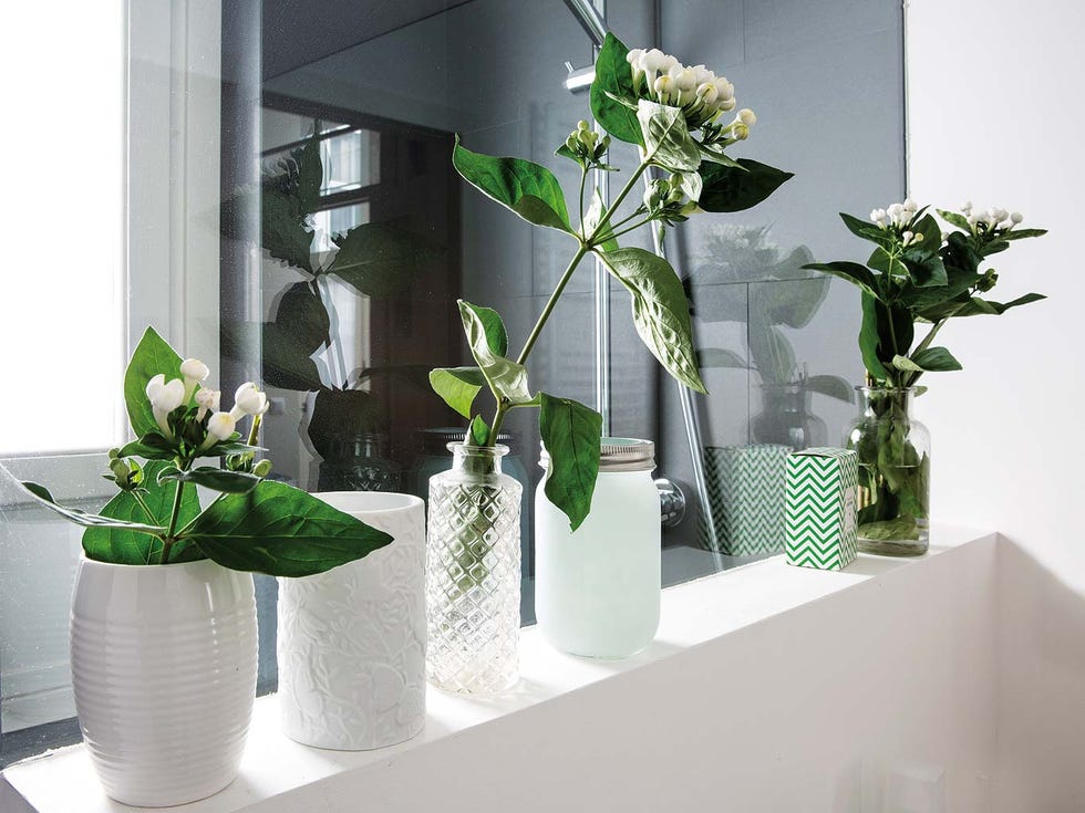 de casa antigua a vivienda moderna baño