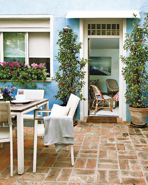 Plant, Flowerpot, Furniture, Fixture, Outdoor table, Outdoor furniture, Houseplant, House, Interior design, Shrub, 
