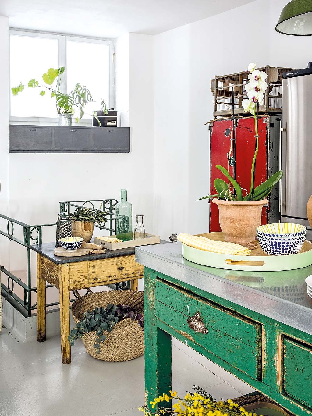 Green, Room, Interior design, Table, Interior design, Fixture, Light fixture, Home, Countertop, Houseplant, 