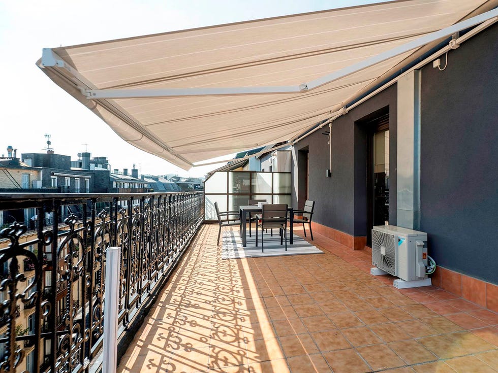 Shade, Roof, Outdoor furniture, Balcony, Awning, Fence, Tile, Handrail, Outdoor table, 