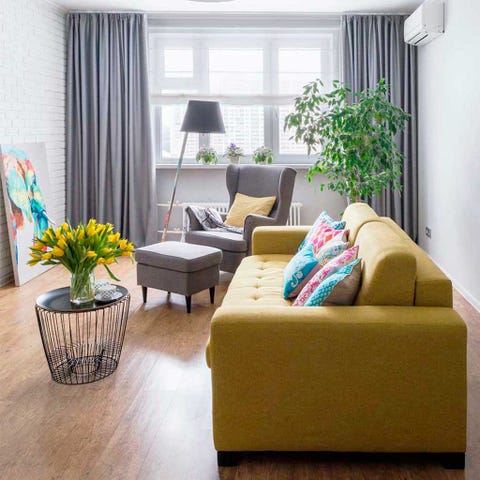 Living room, Furniture, Room, Interior design, Coffee table, Property, Yellow, Floor, Curtain, Couch, 