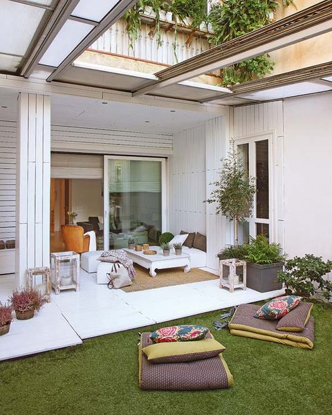 porche y jardín con techo móvil