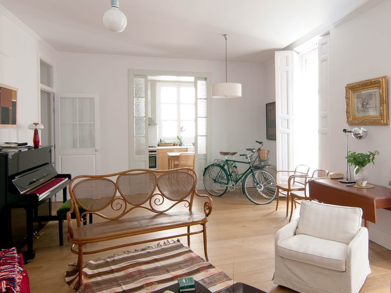 Wood, Room, Interior design, Musical instrument, Floor, Flooring, Bicycle wheel, Musical instrument accessory, Furniture, Hardwood, 