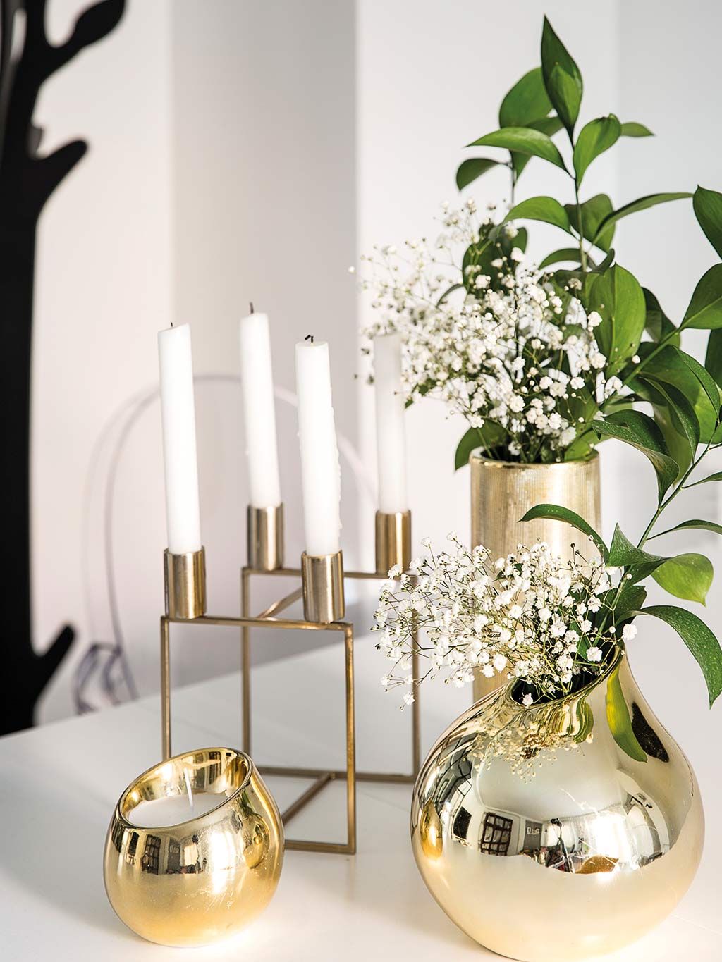 White, Vase, Table, Room, Interior design, Material property, Centrepiece, Glass, Interior design, Plant, 