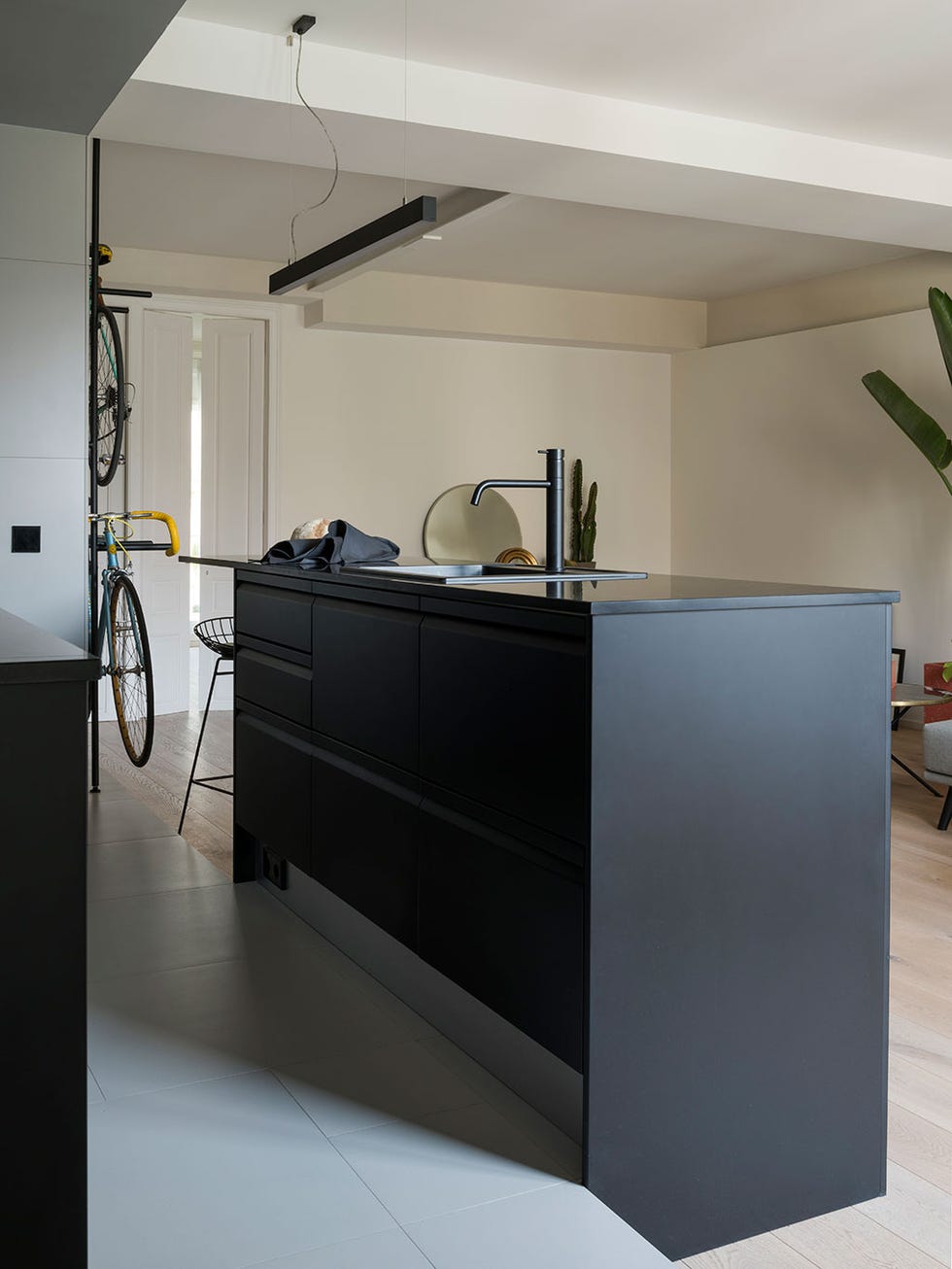 Furniture, Room, Interior design, Cabinetry, Countertop, Floor, Architecture, Material property, Kitchen, Table, 