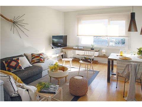 Living room, Room, Furniture, Interior design, Property, Coffee table, Table, Yellow, Building, Couch, 