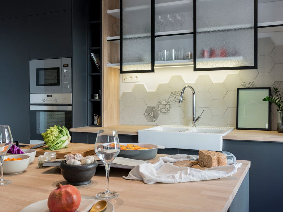 Room, Interior design, Glass, Table, Wine glass, Tableware, Wall, Countertop, Floor, Interior design, 