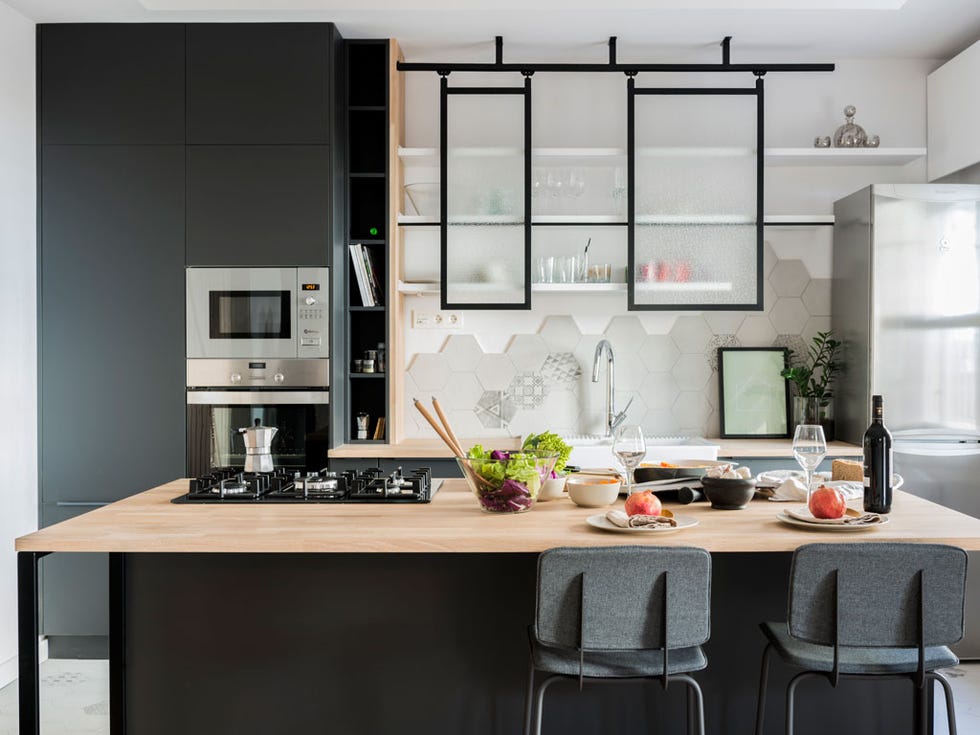 Room, Interior design, Green, Glass, Table, Furniture, Home appliance, Interior design, Home, Drinkware, 