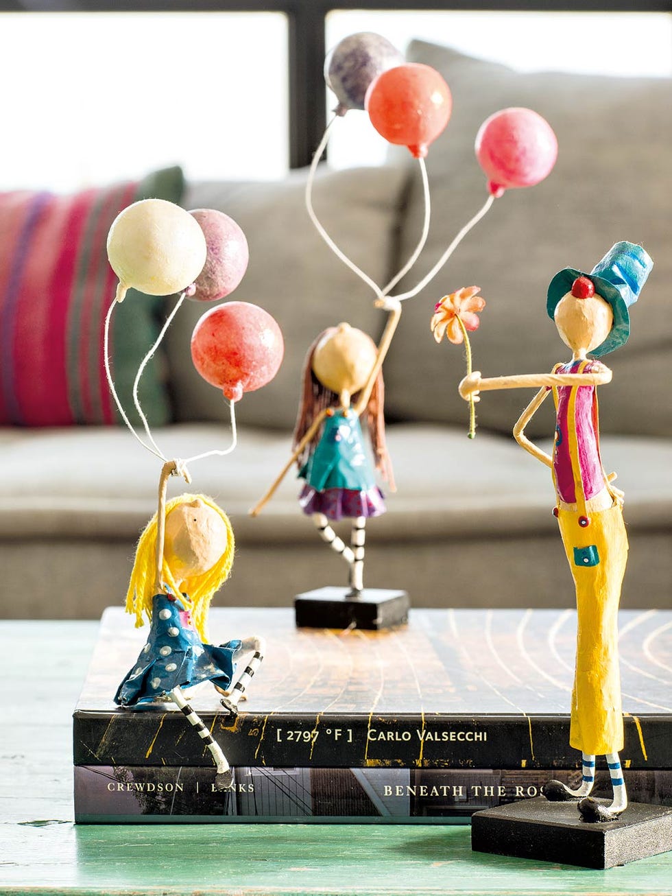 Figurine, Action figure, Toy, Art, Balloon, Table, Sculpture, Style, Ornament, 