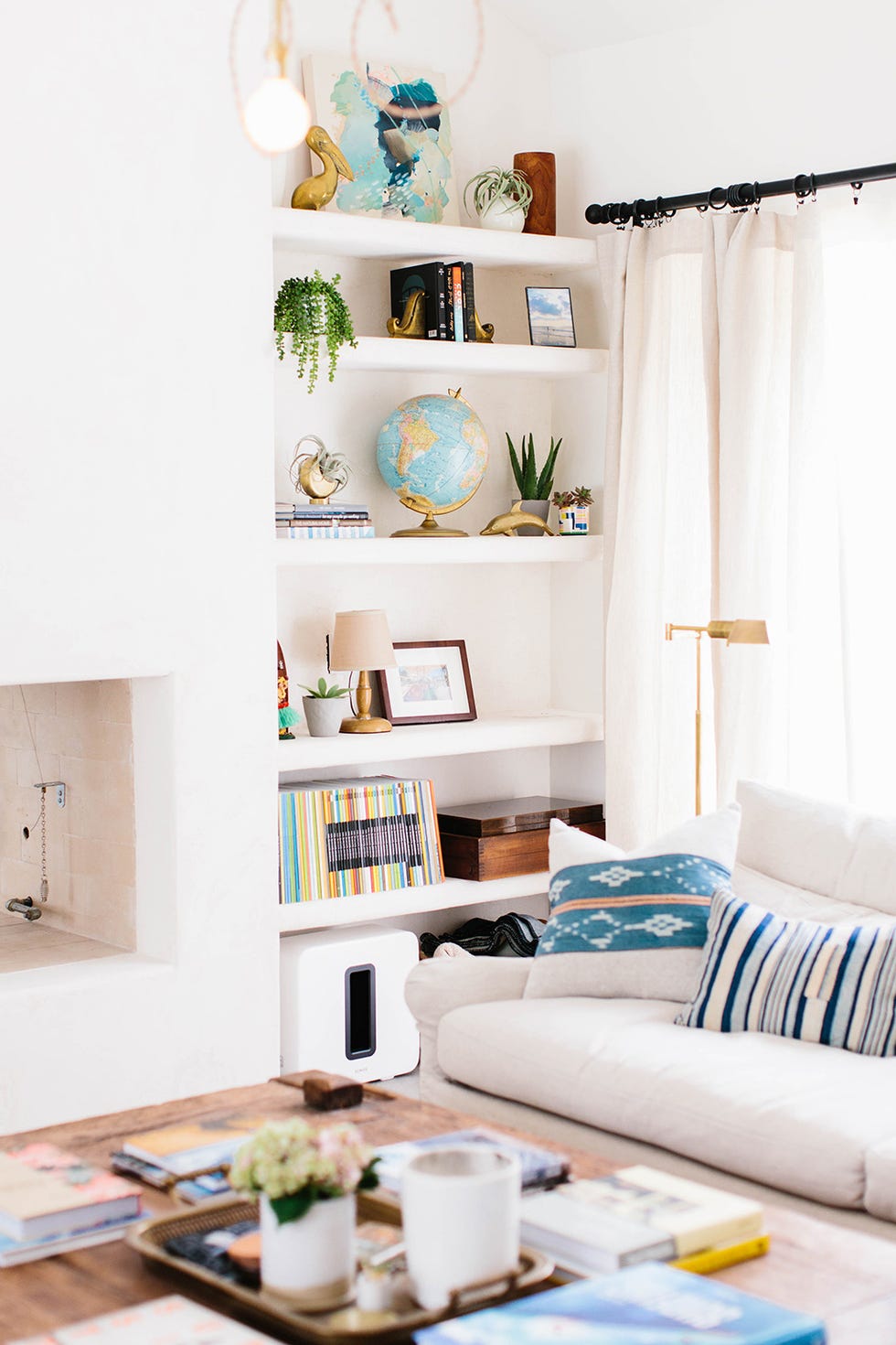 Room, Furniture, Living room, Interior design, Shelf, Blue, Turquoise, Wall, Home, Table, 