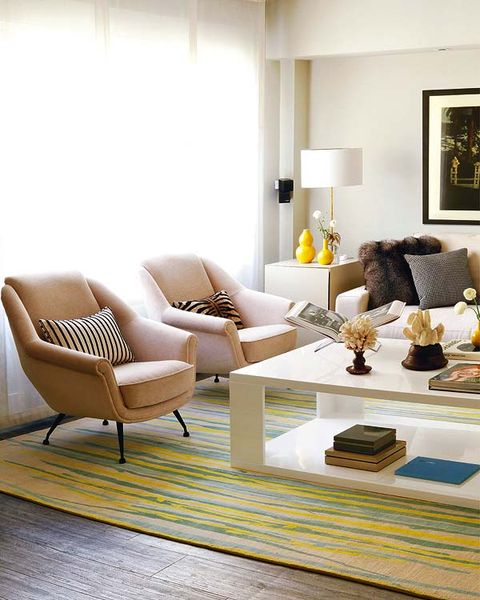 Living room, Furniture, Room, Interior design, Floor, Coffee table, Property, Couch, Yellow, Table, 