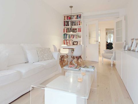 Room, Living room, White, Furniture, Property, Interior design, Floor, Building, Wall, Table, 