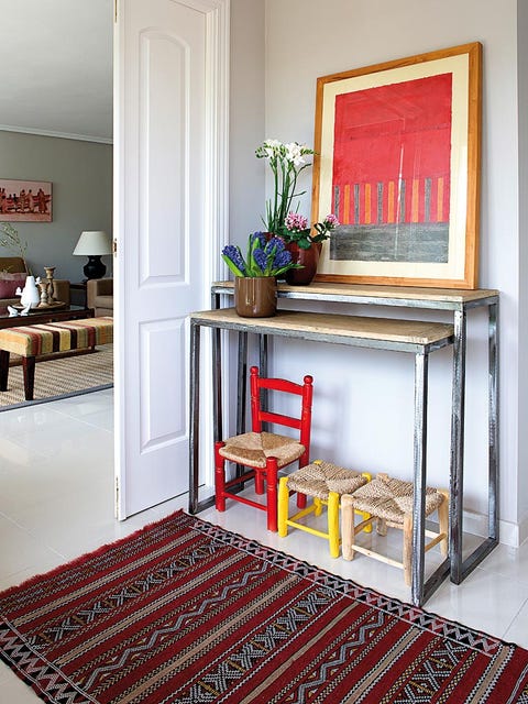 Furniture, Room, Shelf, Red, Table, Floor, Interior design, Yellow, Carpet, Shelving, 