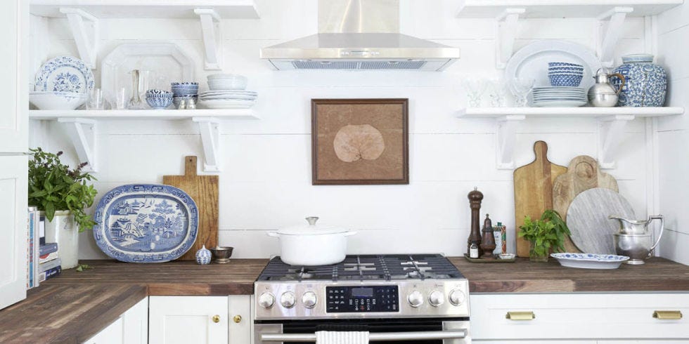 White, Room, Furniture, Interior design, Wall, Kitchen, Shelf, Living room, Table, Material property, 