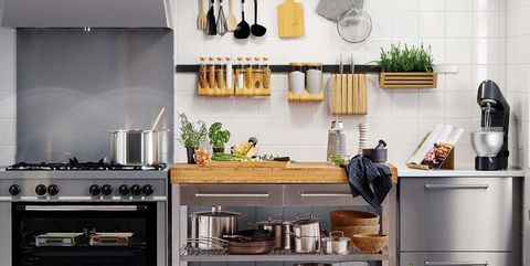 Countertop, Room, Kitchen, Furniture, Cabinetry, Kitchen stove, Interior design, Shelf, Small appliance, Tile, 