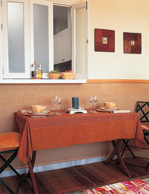 Room, Interior design, Furniture, Table, Tablecloth, Linens, Fixture, Orange, Interior design, Dining room, 
