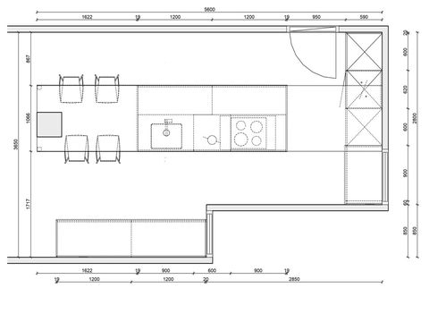 Una cocina abierta de planta y distribución rectangular