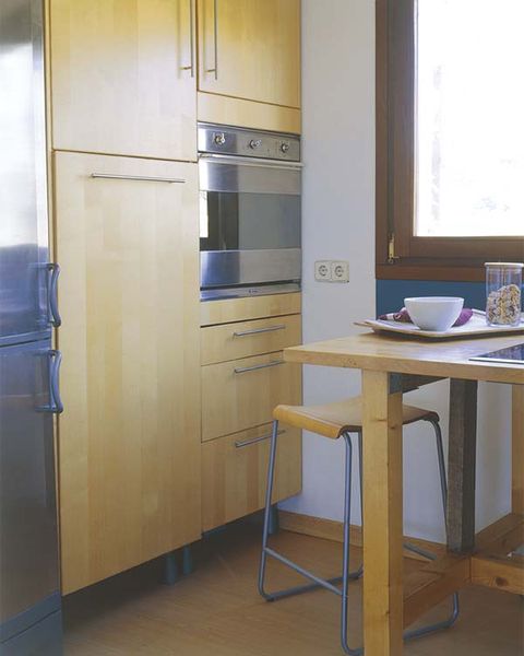 Room, Table, Major appliance, Furniture, Kitchen appliance, Refrigerator, Floor, Cabinetry, Fixture, Freezer, 