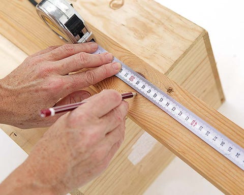 Wood, Finger, Hardwood, Wood stain, Tool, Nail, Beige, Measuring instrument, Plywood, Office ruler, 