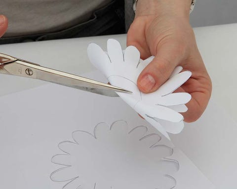 Finger, Kitchen utensil, Art, Nail, Feather, Tool, Cutlery, Paper product, Paper, Office supplies, 