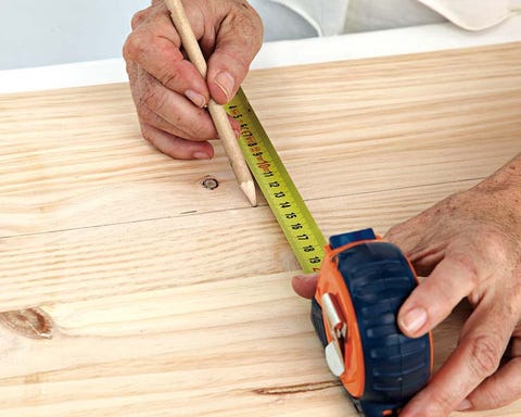 Wood, Finger, Hand, Wrist, Hardwood, Wood stain, Nail, Thumb, Auto part, Rim, 