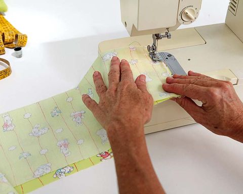 Finger, Yellow, Hand, Sewing machine, Sewing, Wrist, Nail, Sewing machine feet, Household appliance accessory, Pattern, 