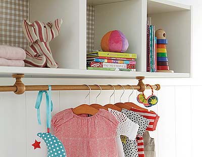 Room, Interior design, Textile, Wall, Clothes hanger, Shelving, Linens, Interior design, Home accessories, Home, 