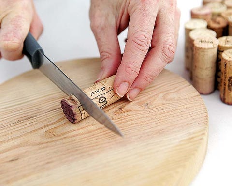 Wood, Finger, Cork, Hardwood, Wrist, Wood stain, Thumb, Nail, Kitchen utensil, Plywood, 