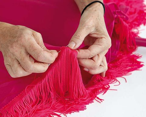 Finger, Magenta, Textile, Pink, Wrist, Costume accessory, Nail, Violet, Natural material, Hair coloring, 