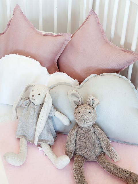 Textile, Pink, Toy, Pillow, Throw pillow, Cushion, Peach, Creative arts, Plush, Doll, 