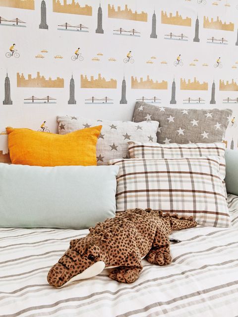 Room, Textile, Stuffed toy, Linens, Pillow, Furniture, Wall, Cushion, Interior design, Throw pillow, 