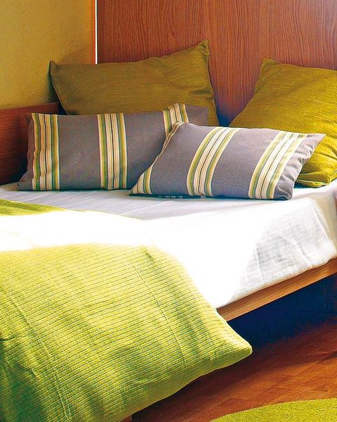 Green, Yellow, Room, Interior design, Textile, Wall, Linens, Orange, Cushion, Bedding, 