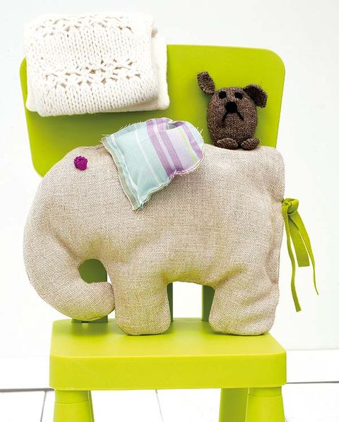 Green, Toy, Rectangle, Bear, Creative arts, Stuffed toy, Teddy bear, Animal figure, Plush, Craft, 